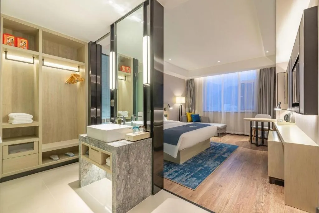 Bed in Echarm Hotel Tai'an Taishan Tianwai Village Hongmen