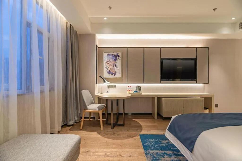 Bed in Echarm Hotel Tai'an Taishan Tianwai Village Hongmen