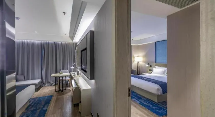 Bed in Echarm Hotel Tai'an Taishan Tianwai Village Hongmen