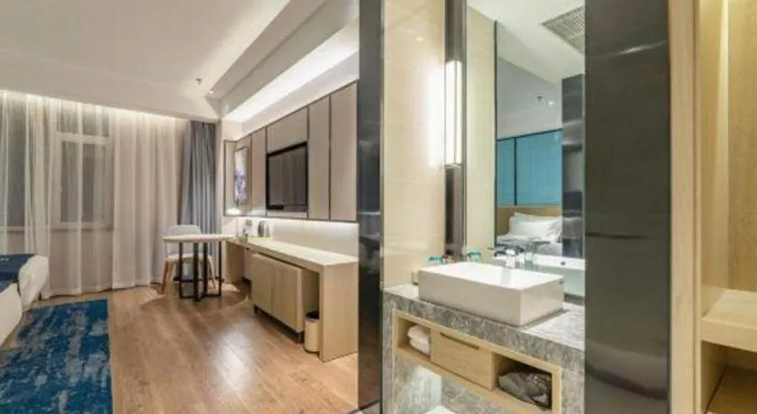 Bed in Echarm Hotel Tai'an Taishan Tianwai Village Hongmen