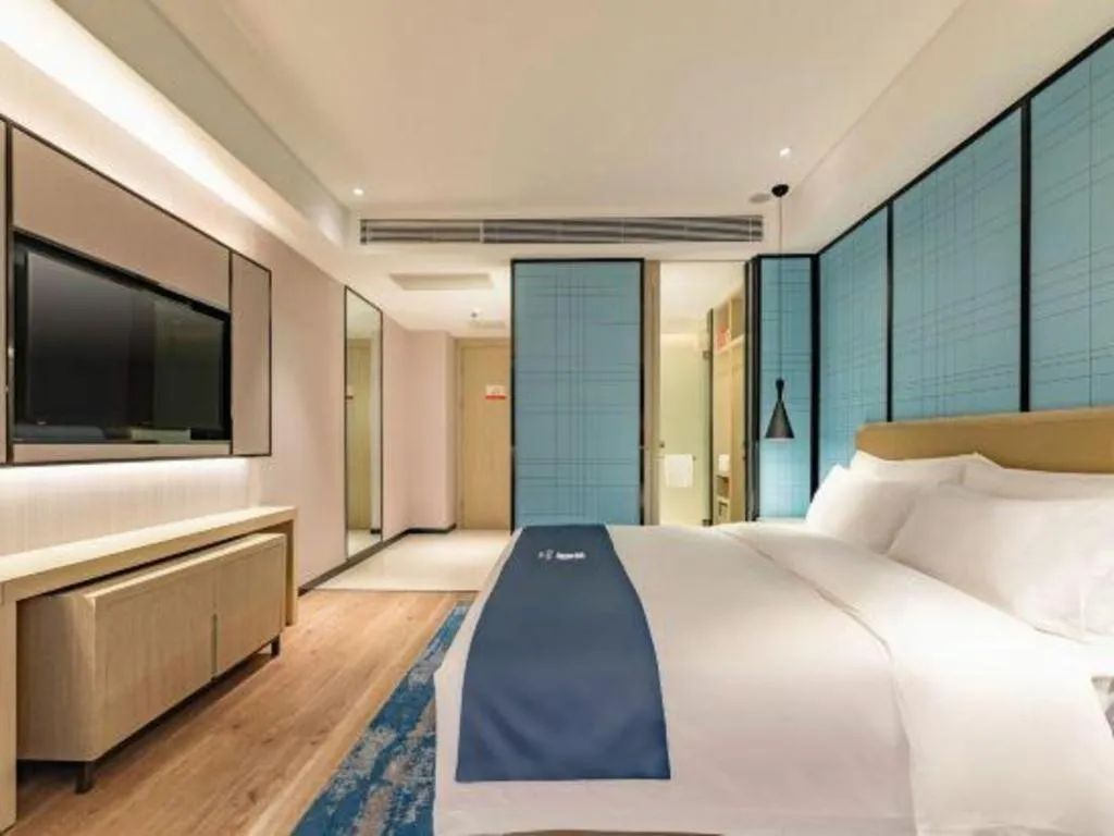 Bed in Echarm Hotel Tai'an Taishan Tianwai Village Hongmen