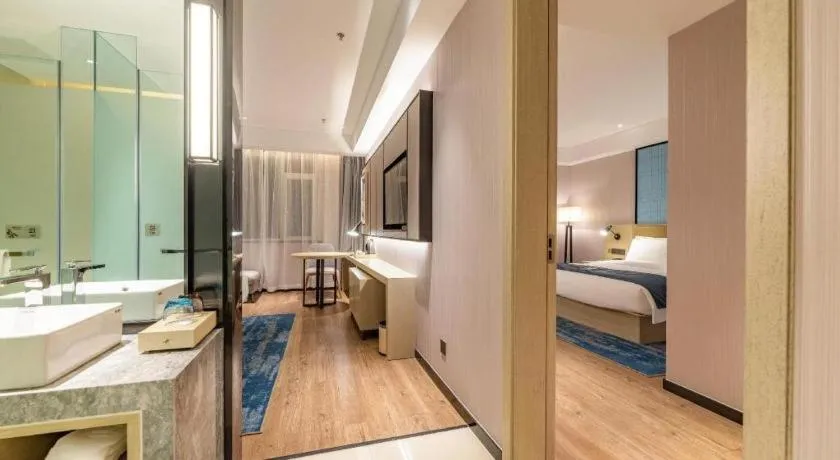 Bed in Echarm Hotel Tai'an Taishan Tianwai Village Hongmen