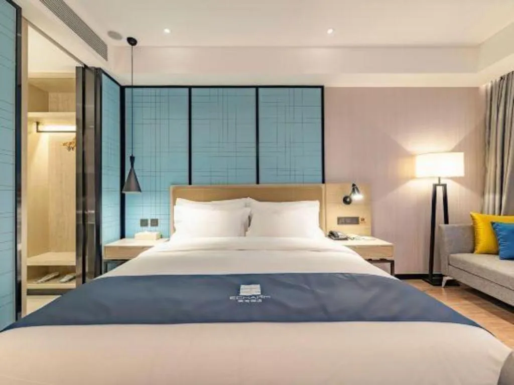 Bed in Echarm Hotel Tai'an Taishan Tianwai Village Hongmen