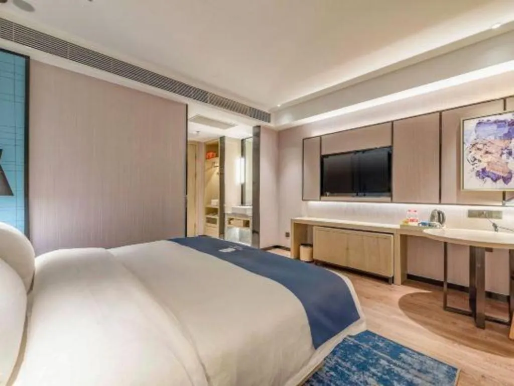 Bed in Echarm Hotel Tai'an Taishan Tianwai Village Hongmen