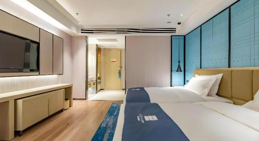 Bed in Echarm Hotel Tai'an Taishan Tianwai Village Hongmen