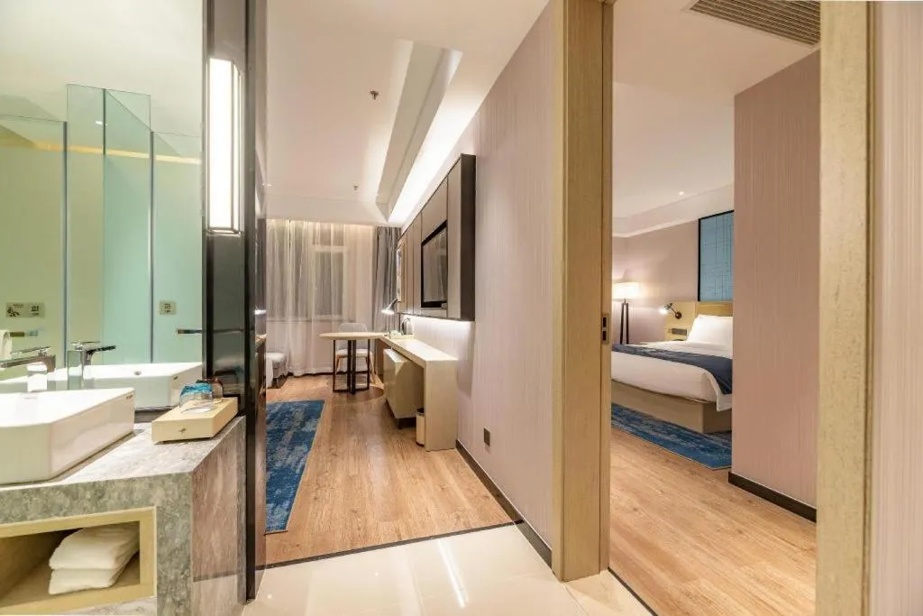 Bed in Echarm Hotel Tai'an Taishan Tianwai Village Hongmen