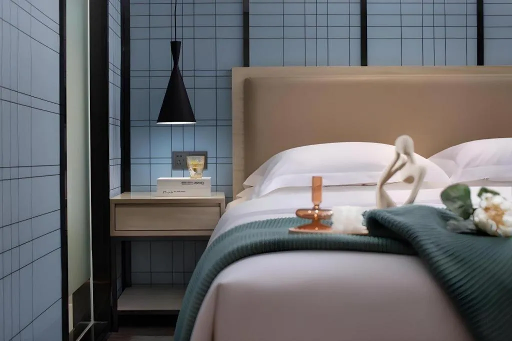 Bed in Echarm Hotel Tai'an Taishan Tianwai Village Hongmen