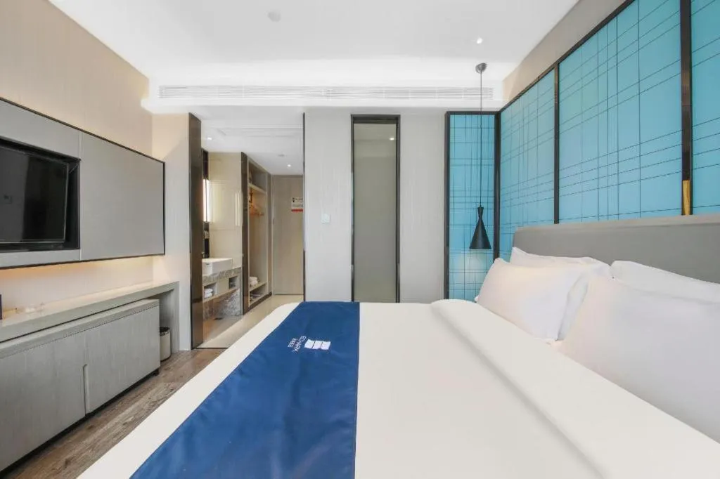 Bed in Echarm Hotel Tai'an Taishan Tianwai Village Hongmen