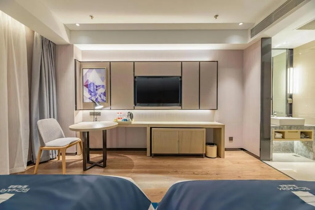 Bed in Echarm Hotel Tai'an Taishan Tianwai Village Hongmen