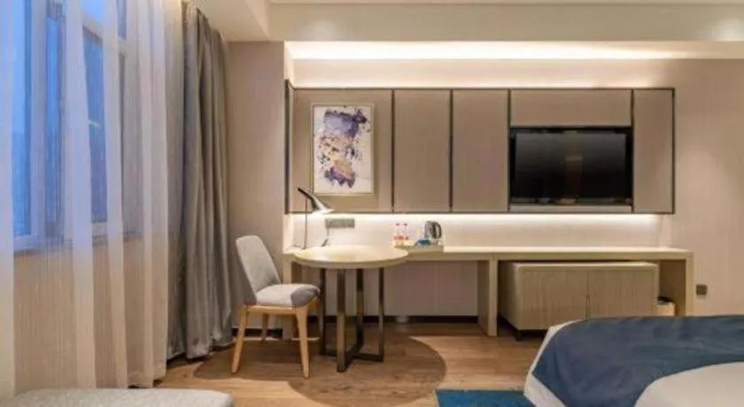 Bed in Echarm Hotel Tai'an Taishan Tianwai Village Hongmen