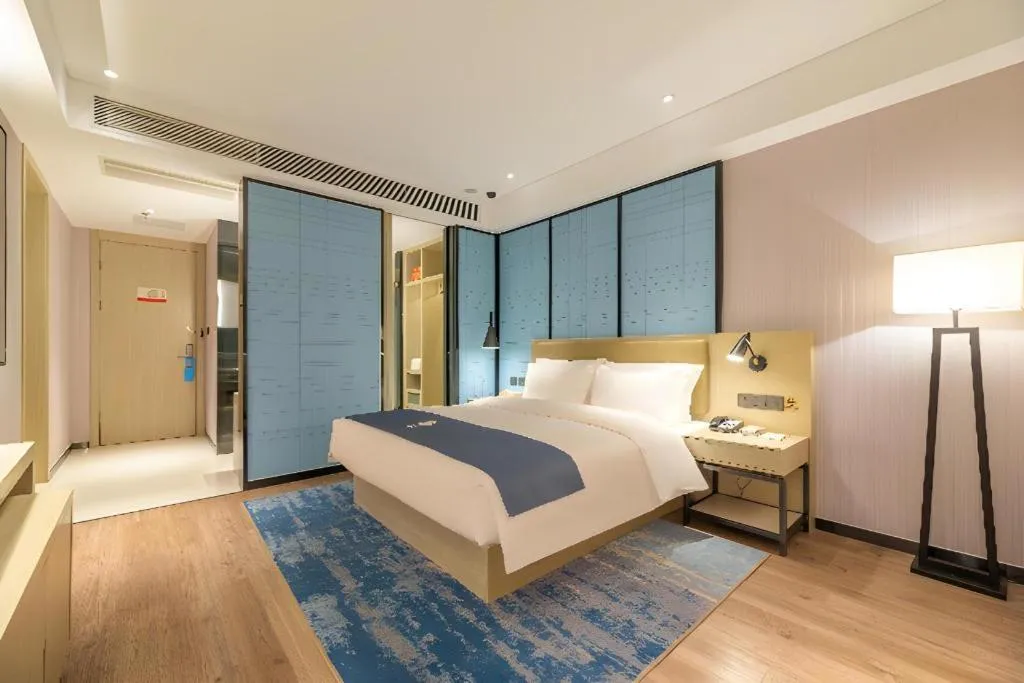 Bed in Echarm Hotel Tai'an Taishan Tianwai Village Hongmen