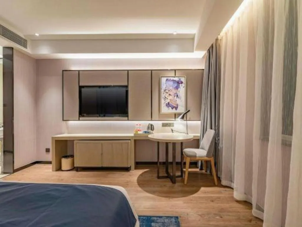 Bed in Echarm Hotel Tai'an Taishan Tianwai Village Hongmen