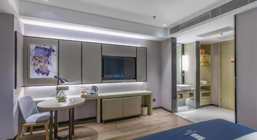 Bed in Echarm Hotel Tai'an Taishan Tianwai Village Hongmen