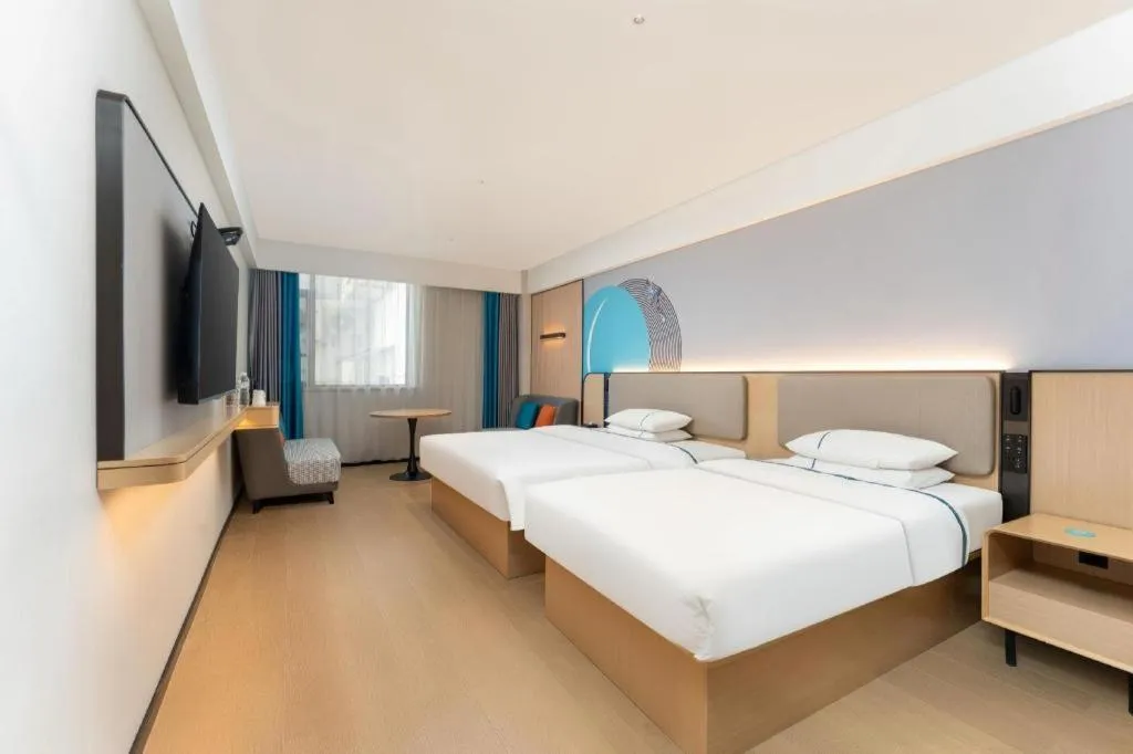 Bed in City Comfort Inn Shiyan Wudang Mountain