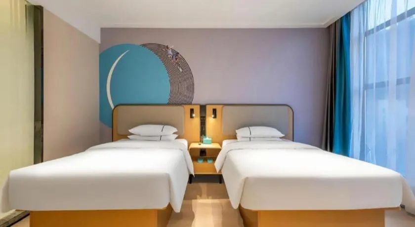 Bed in City Comfort Inn Shiyan Wudang Mountain