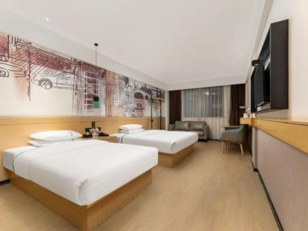 Bed in City Comfort Inn Shiyan Wudang Mountain