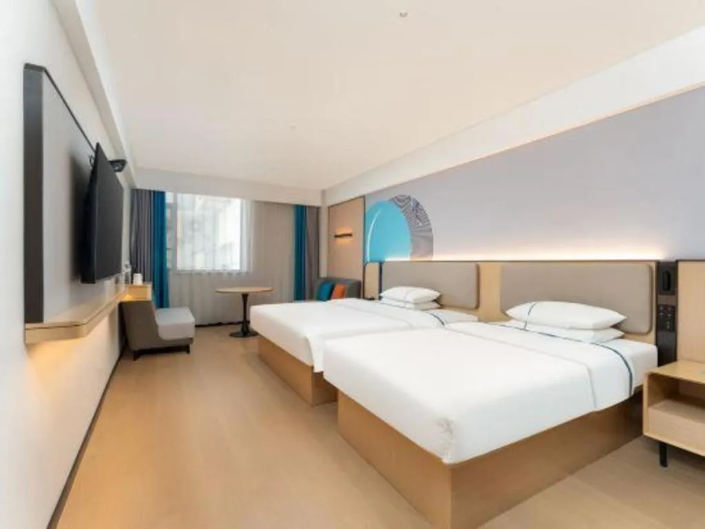 Bed in City Comfort Inn Shiyan Wudang Mountain