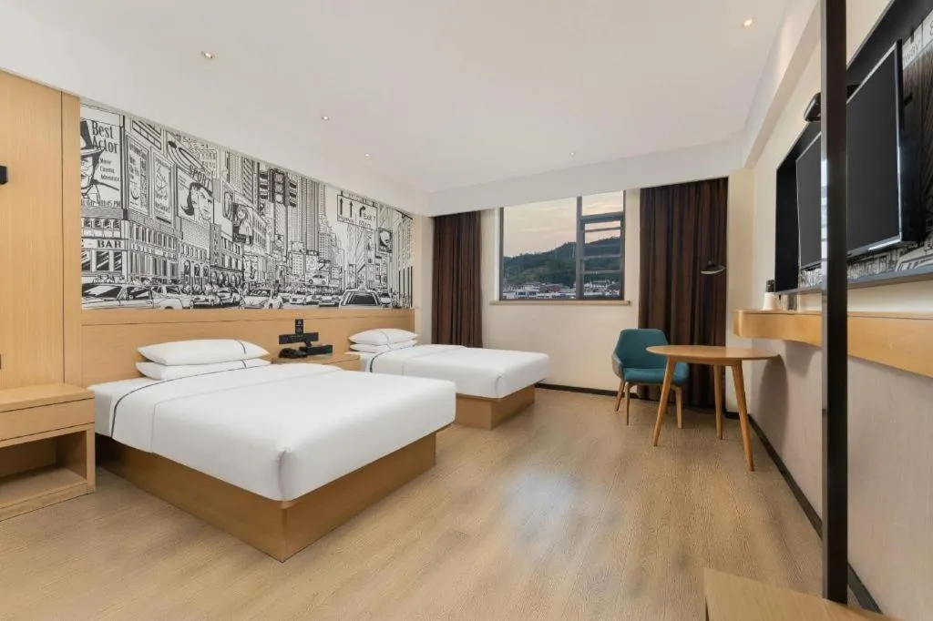 Bed in City Comfort Inn Shiyan Wudang Mountain