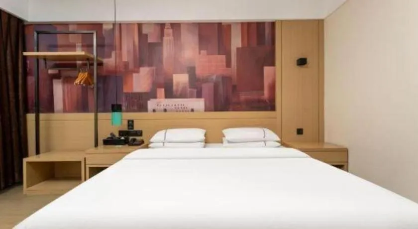 Bed in City Comfort Inn Shiyan Wudang Mountain