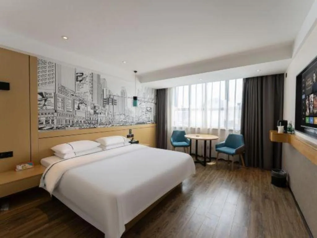 Bed in City Comfort Inn Fuchuan Fenghuang Road