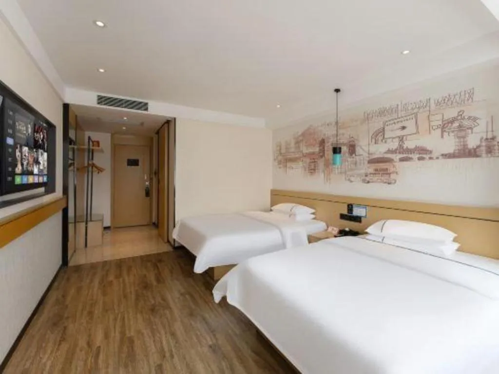 Bed in City Comfort Inn Fuchuan Fenghuang Road