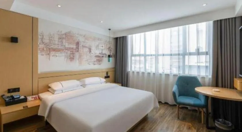 Bed in City Comfort Inn Fuchuan Fenghuang Road