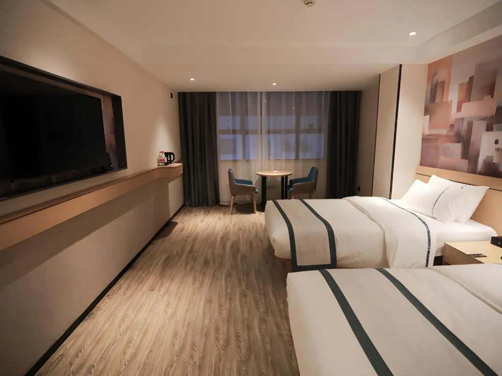 Bed in City Comfort Inn Fuchuan Fenghuang Road