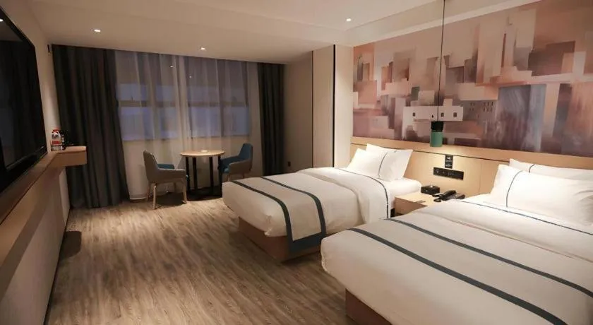 Bed in City Comfort Inn Fuchuan Fenghuang Road