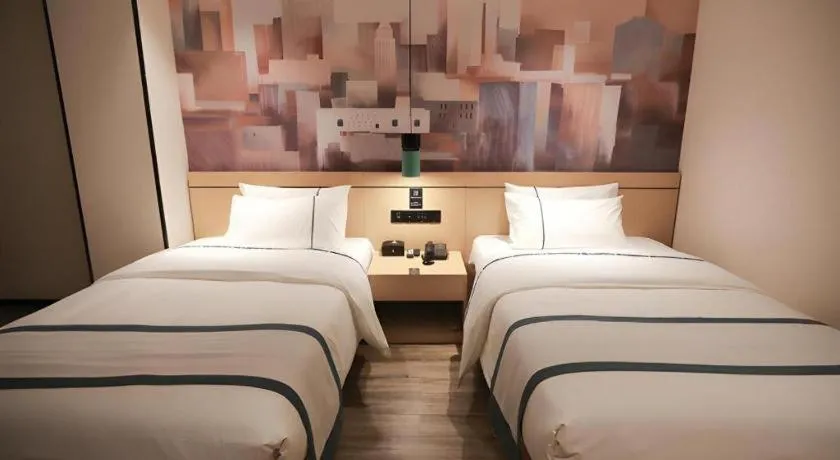 Bed in City Comfort Inn Fuchuan Fenghuang Road