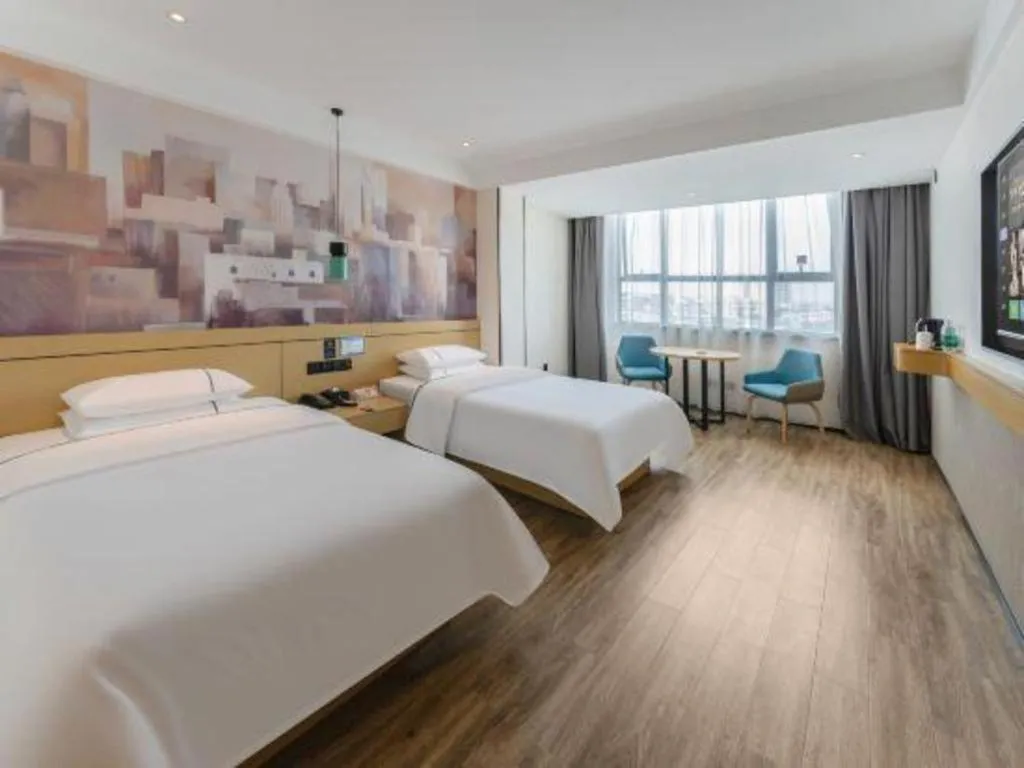 Bed in City Comfort Inn Fuchuan Fenghuang Road