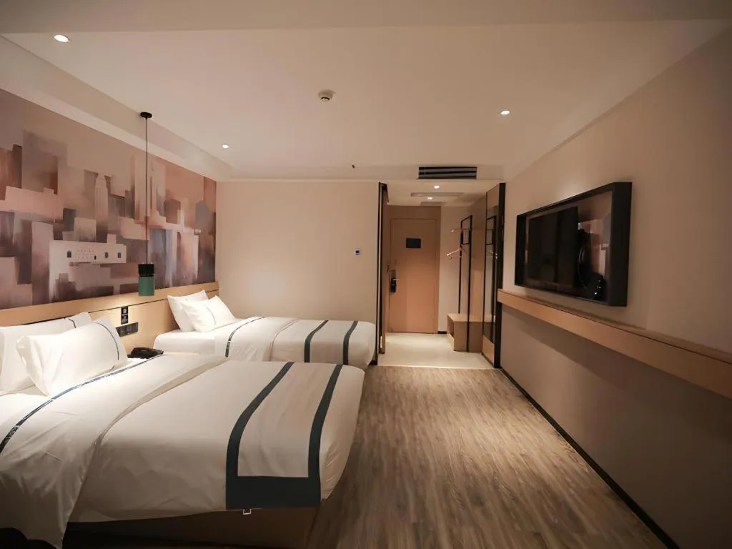 Bed in City Comfort Inn Fuchuan Fenghuang Road