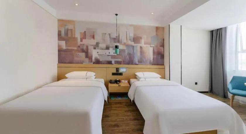 Bed in City Comfort Inn Fuchuan Fenghuang Road