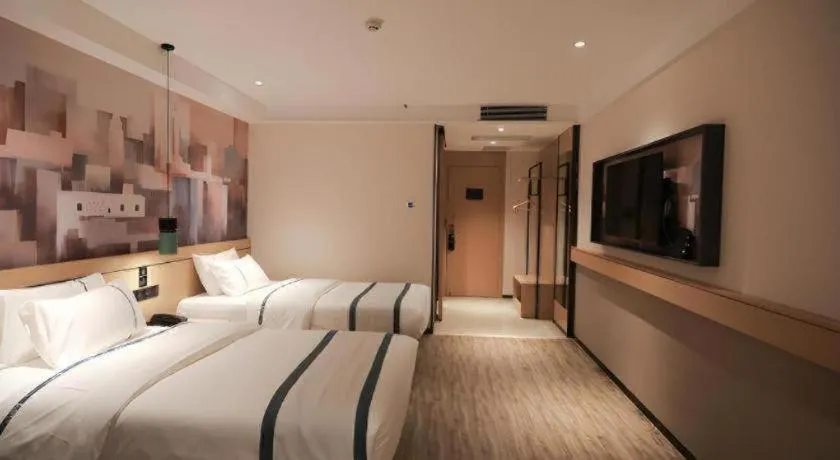 Bed in City Comfort Inn Fuchuan Fenghuang Road