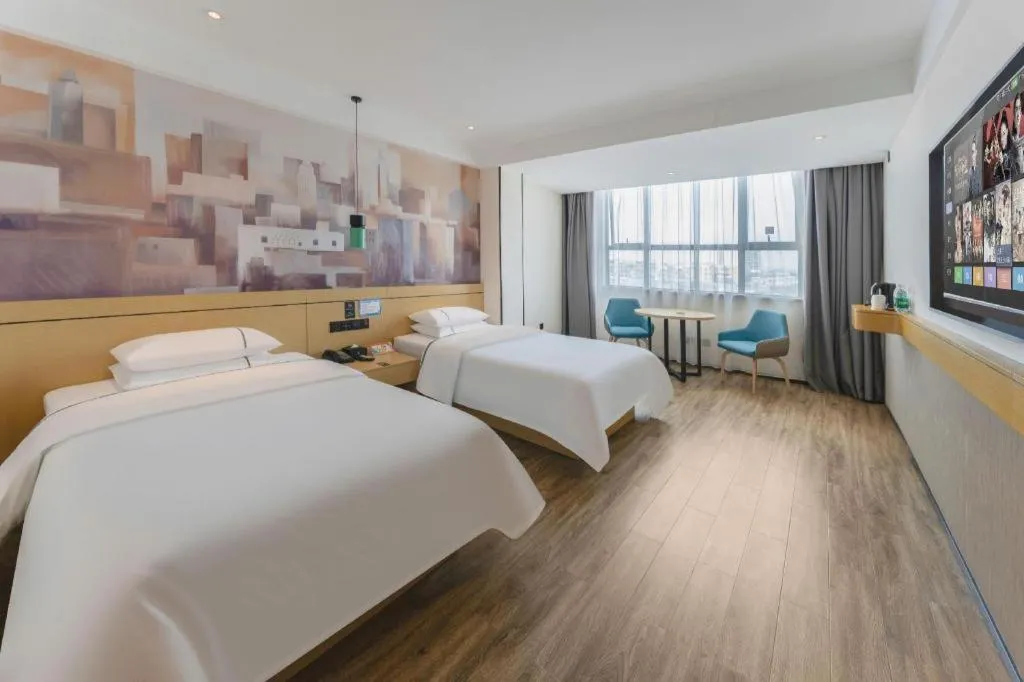 Bed in City Comfort Inn Fuchuan Fenghuang Road