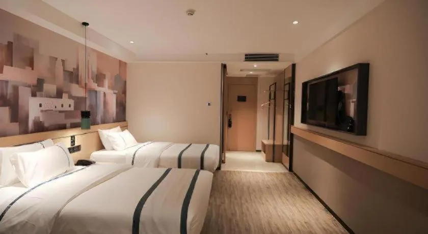 Bed in City Comfort Inn Fuchuan Fenghuang Road