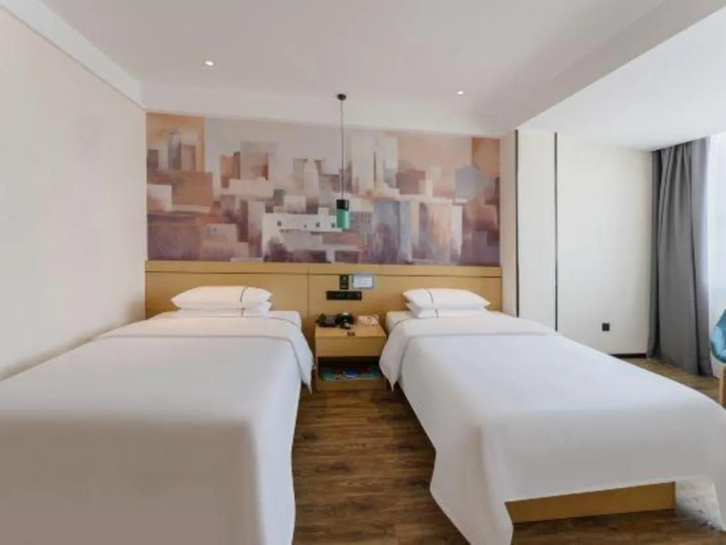 Bed in City Comfort Inn Fuchuan Fenghuang Road