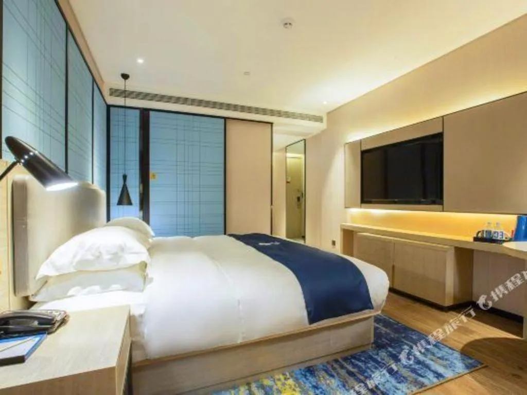 Bed in Echarm Hotel Nanning Dongge Macun Metro Station