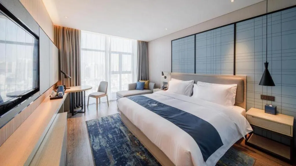 Bed in Echarm Hotel Nanning Dongge Macun Metro Station