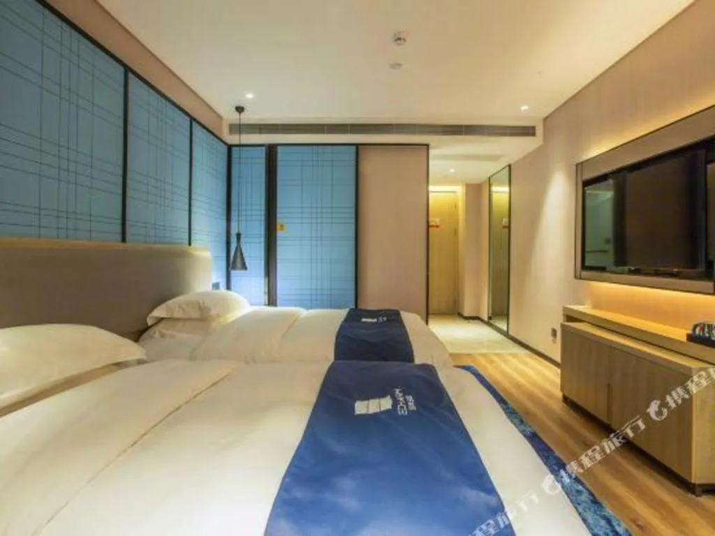 Bed in Echarm Hotel Nanning Dongge Macun Metro Station