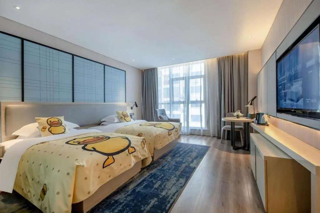 Bed in Echarm Hotel Nanning Dongge Macun Metro Station