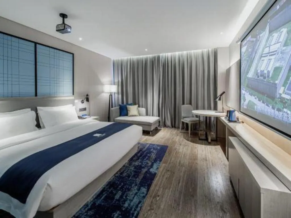 Bed in Echarm Hotel Nanning Dongge Macun Metro Station