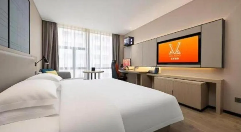 Bed in Echarm Hotel Nanning Dongge Macun Metro Station