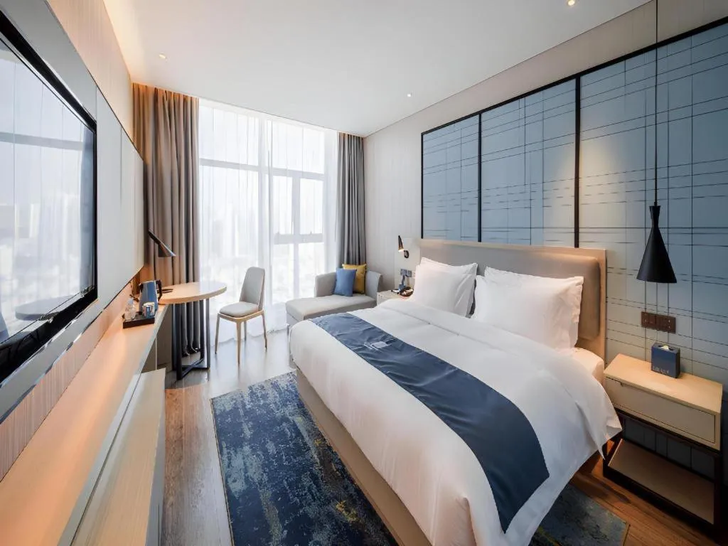 Bed in Echarm Hotel Nanning Dongge Macun Metro Station