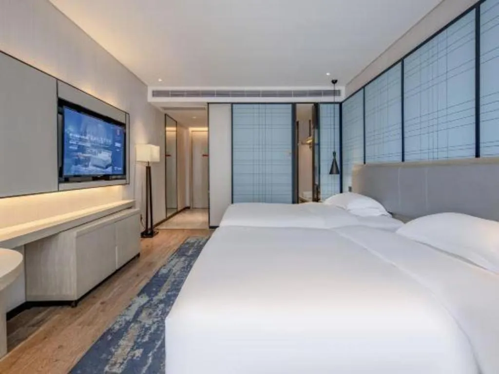 Bed in Echarm Hotel Nanning Dongge Macun Metro Station