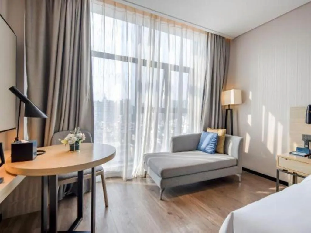 Bed in Echarm Hotel Nanning Dongge Macun Metro Station