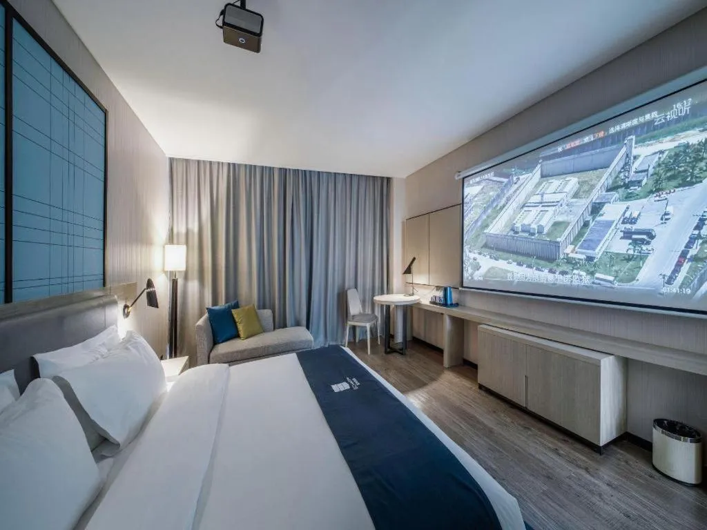 Bed in Echarm Hotel Nanning Dongge Macun Metro Station