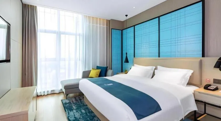 Bed in Echarm Hotel Nanning Dongge Macun Metro Station