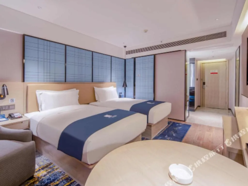 Bed in Echarm Hotel Nanning Dongge Macun Metro Station