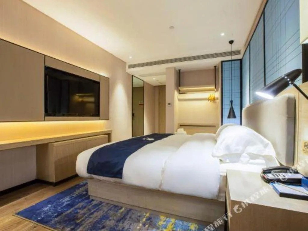 Bed in Echarm Hotel Nanning Dongge Macun Metro Station
