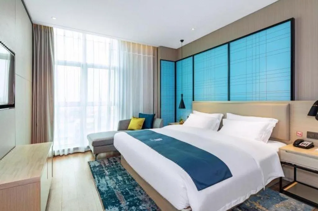 Bed in Echarm Hotel Nanning Dongge Macun Metro Station